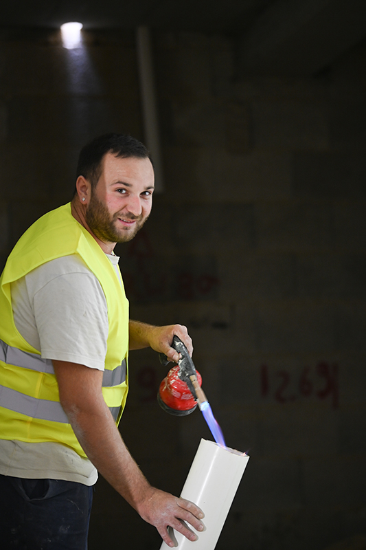Adrain Xiberras working in apprenticeship program